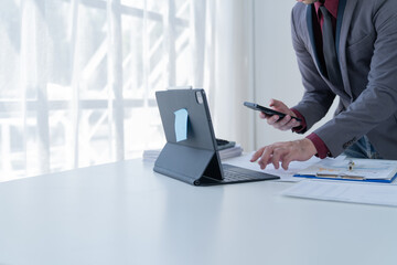 Business Documents concept : Employee woman hands working in Stacks paper files for searching and checking unfinished