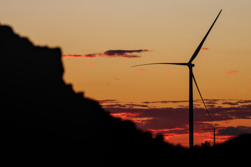Silhouette of large wind turbine at sunset, Australian Outback, near Wiluna, Western Australia © BJP7images