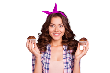 Portrait of nice cheerful girlish attractive adorable good mood wavy-haired lady wearing checkered shirt holding in hands two fresh muffins isolated over violet pastel background