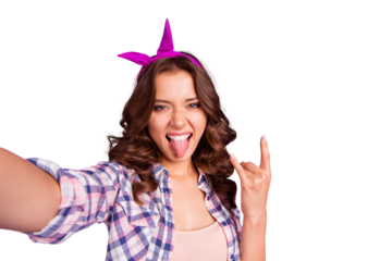 Self-portrait of nice cheeky cheerful cool girlish attractive adorable wavy-haired lady wearing checkered shirt showing rock-n-roll symbol sign isolated over violet pastel background