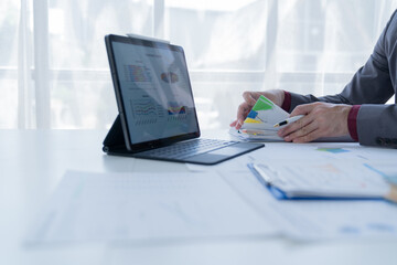 Naklejka premium Business Documents concept : Employee woman hands working in Stacks paper files for searching and checking unfinished