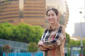 Confident Young Woman Smiling in Urban Environment