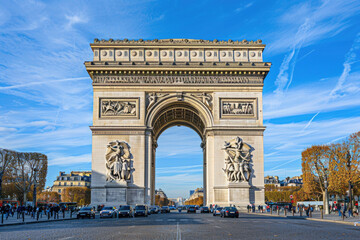 Fototapeta na wymiar The Arc de Triomphe standing tall at the end of the Champs-Elysees in Paris