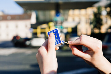 Set fire to spilled oil, drawing carefully flammable. Matches fire in front of fuel station