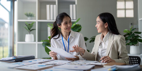 Strategic Planning Discussion in Modern Office Setting