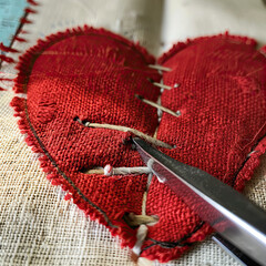 knitting a ripped up red heart 