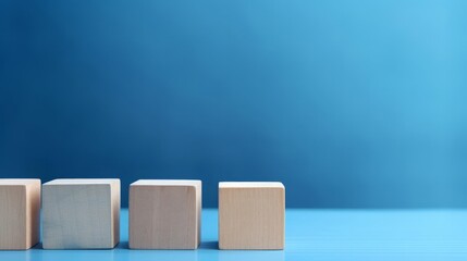 Wooden blocks on a blue surface, close up, simplicity and play, vibrant, Composite, minimalist backdrop