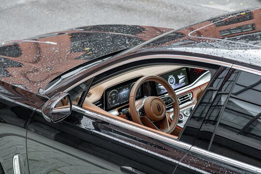 Moscow. Russia, May 2024: Interior of premium car business sedan Hongqi H9  . brown leather interior