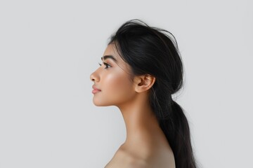 Profile view of a young woman with delicate features