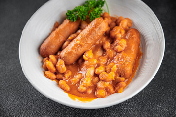 bean sausage meat tomato sauce fresh meal food snack on the table copy space food background rustic top view