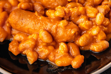 bean sausage meat tomato sauce fresh meal food snack on the table copy space food background rustic top view