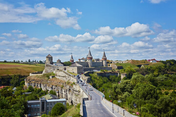 Naklejka premium Dramatic view on the castle in Kamianets-Podilskyi in spring.