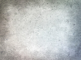 gray textured surface with multi-colored stains