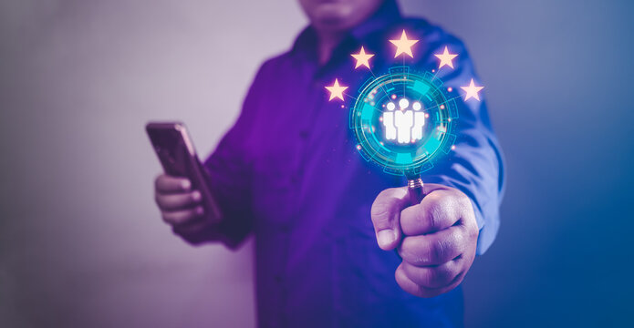 businessman using searching looking for employee concept , magnifying glass