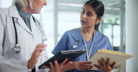 Insurance, medical or tablet with doctor and nurse in hospital for diagnosis, discussion or results. Documents, healthcare and technology with mature woman talking to medicine intern at clinic
