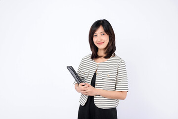 Asian woman is holding a tablet against a white background.