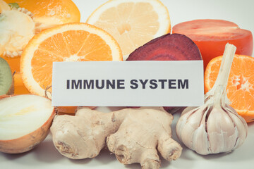 Inscription immune system, fresh healthy fruits and vegetables containing vitamins. Immune boosting...