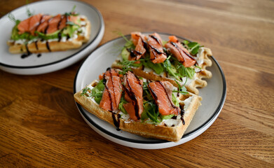 healthy sandwich with cream cheese, red fish and avocado for breakfast