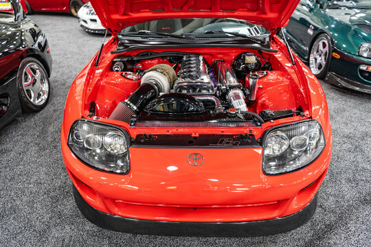 New York City, USA - March 27, 2024: Toyota Supra JZ engine sportscar red car at New York International Auto Show, front view