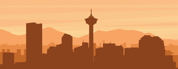 Brown panoramic city skyline poster with misty background buildings, sunrise, clouds and mountains of CALGARY, CANADA