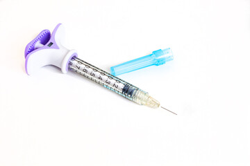 special syringe for aesthetic face fillers. Isolated on white with copy space