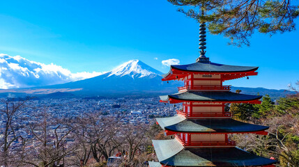 The iconic view of Mount Fuji with the red Chureito pagoda and Fujiyoshida city from Arakurayama...