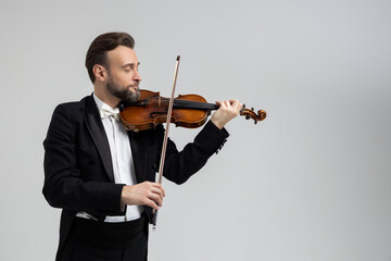 Elegant bearded man with violin instrument