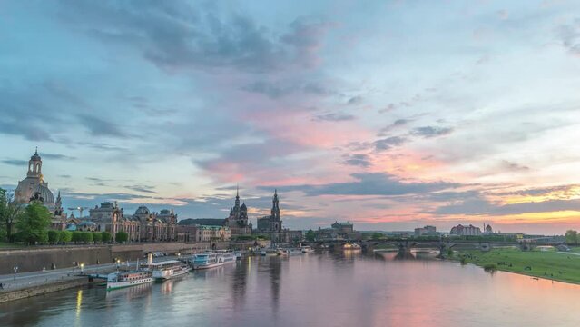 Dresden Germany time lapse, day to night city skyline at Elbe River and Augustus Bridge