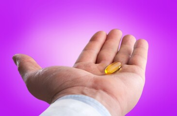 Medical pill in woman hand. Medical concept