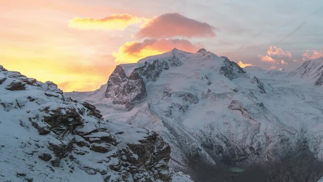 Gornergrat Zermatt Switzerland time lapse, Monte Rosa peak and Alps mountain range sunrise view from Gornergrat in winter