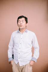 A man whistling, captured in a moment of joy or concentration, expressing himself through a melodic...