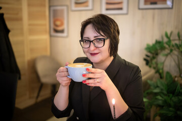 Portrait of a young beautiful dark-haired girl on her birthday.