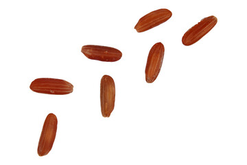 Obraz premium close up of scattered red rice grains isolated transparent