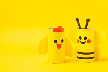 Toilet paper crafts on a colored background. Kids crafts made with toilet paper roll. DIY. Handmade. Paper toys. Origami animals. Concept of children's educational games. Place for text. Copy space.