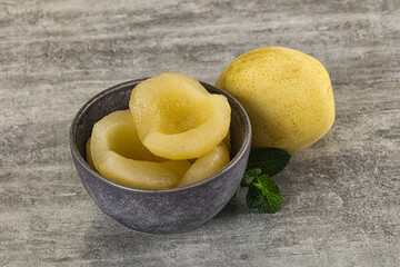 Canned yellow pear with syrup