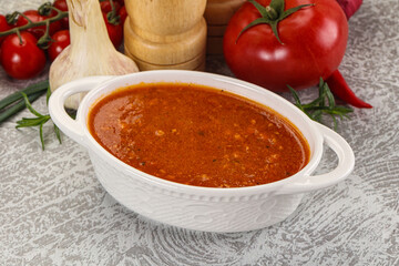 Hot tomato soup with diced chicken