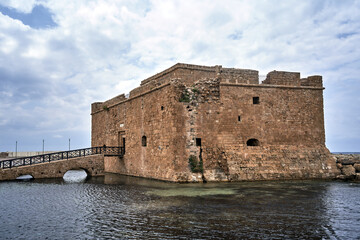 Ruins of a medieval stone castle in the port of Paphos