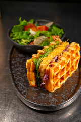 Waffle sandwich with salad