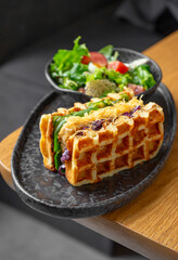 Waffle sandwich with salad
