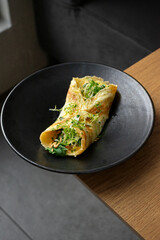 Omelette with avocado and crab