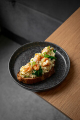 Bruschetta with omelet and shrimp