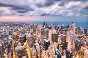 Illuminated Chicago Aerial Skyline View at Dusk with Clouds