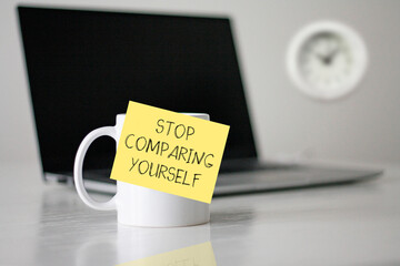 Stop Comparing Yourself is shown using the text on the sticker
