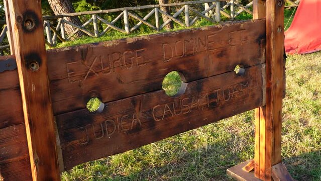 The pillory is the deck. Medieval wooden stocks are a device used for corporal punishment.