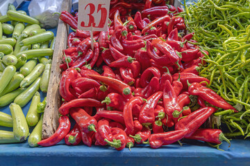 Big Bunch of Fresh Red Chilli Peppers at Farmers Market