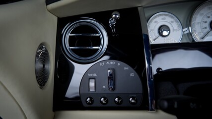 Headlight controls in a car