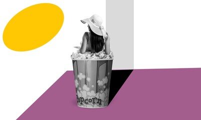 Photo collage funny person lying on huge popcorn bucket