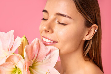 Cosmetology, beauty and spa treatment. Woman in lingerie on pink background.