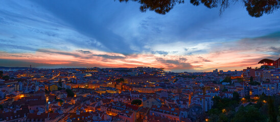 Beautiful panoramic sunset over Lisbon, Portugal. View from Graca viewpoint .