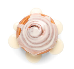 Tasty homemade cinnamon roll with glaze on white background